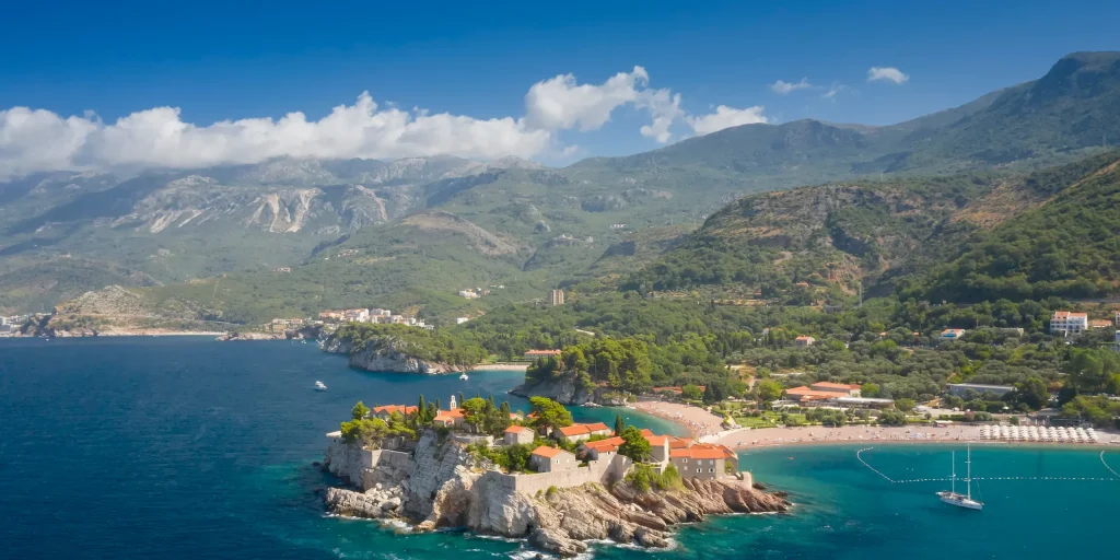 aerial view at Sveti Stefan islet in Montenegro Diva rent a car Montenegro